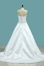 Load image into Gallery viewer, 2024 Satin Wedding Dress Strapless A Line With Beads And Ruffles Chapel Train